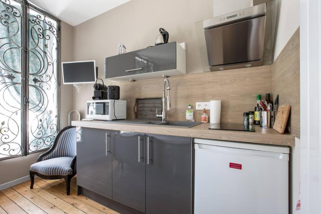 Le 31 Au Coeur Des Places Apartment *